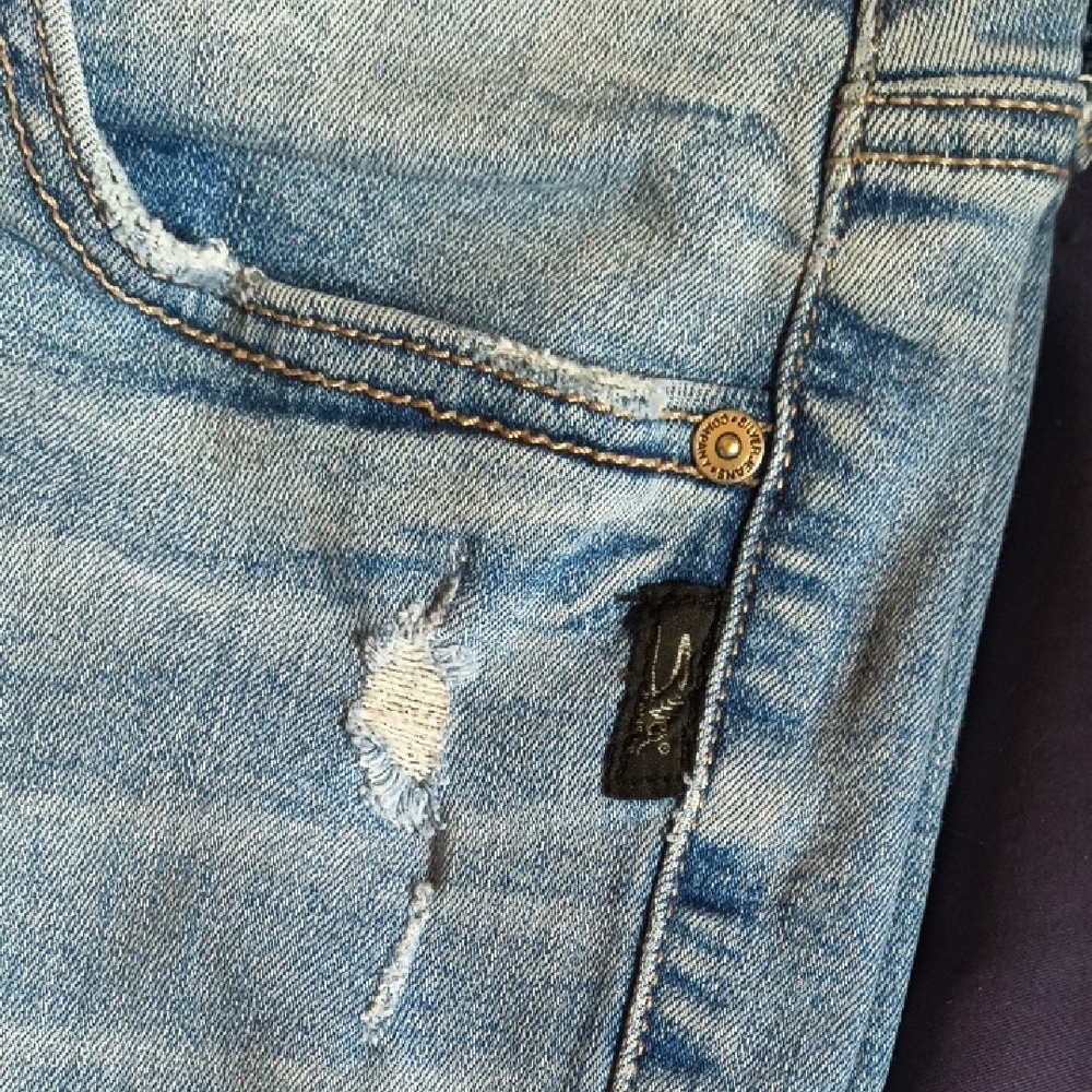 Woman's Silver Jeans Blue Distressed Denim